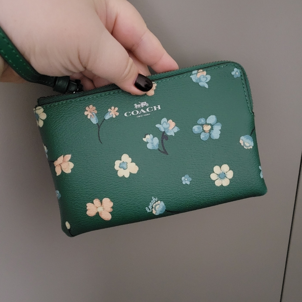 Coach wristlet with floral print